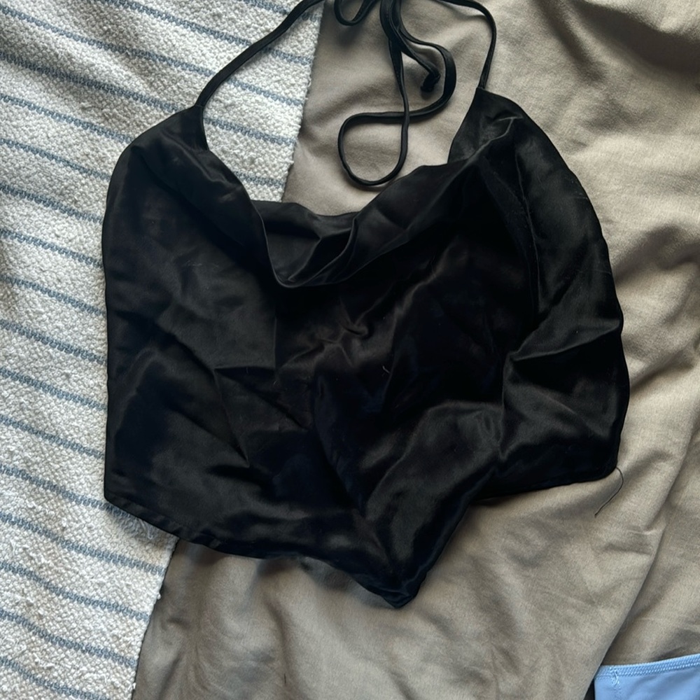 silk black going out top. front folds over.